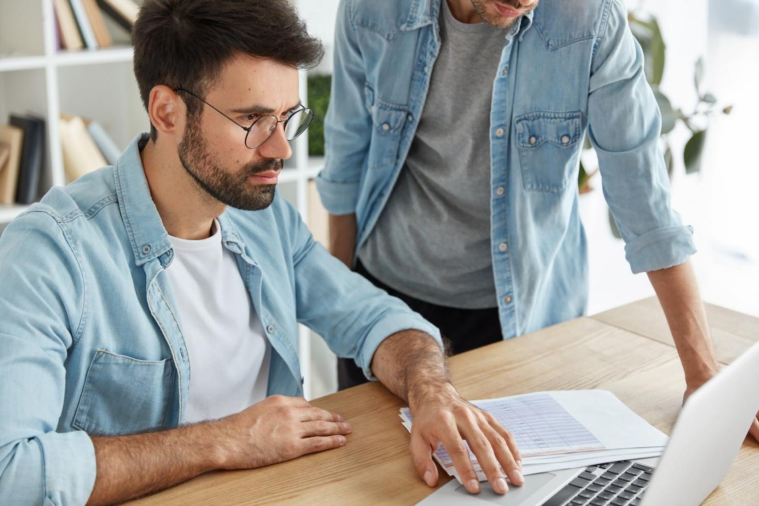 Financial analysis documents and charts showing budget optimization strategies